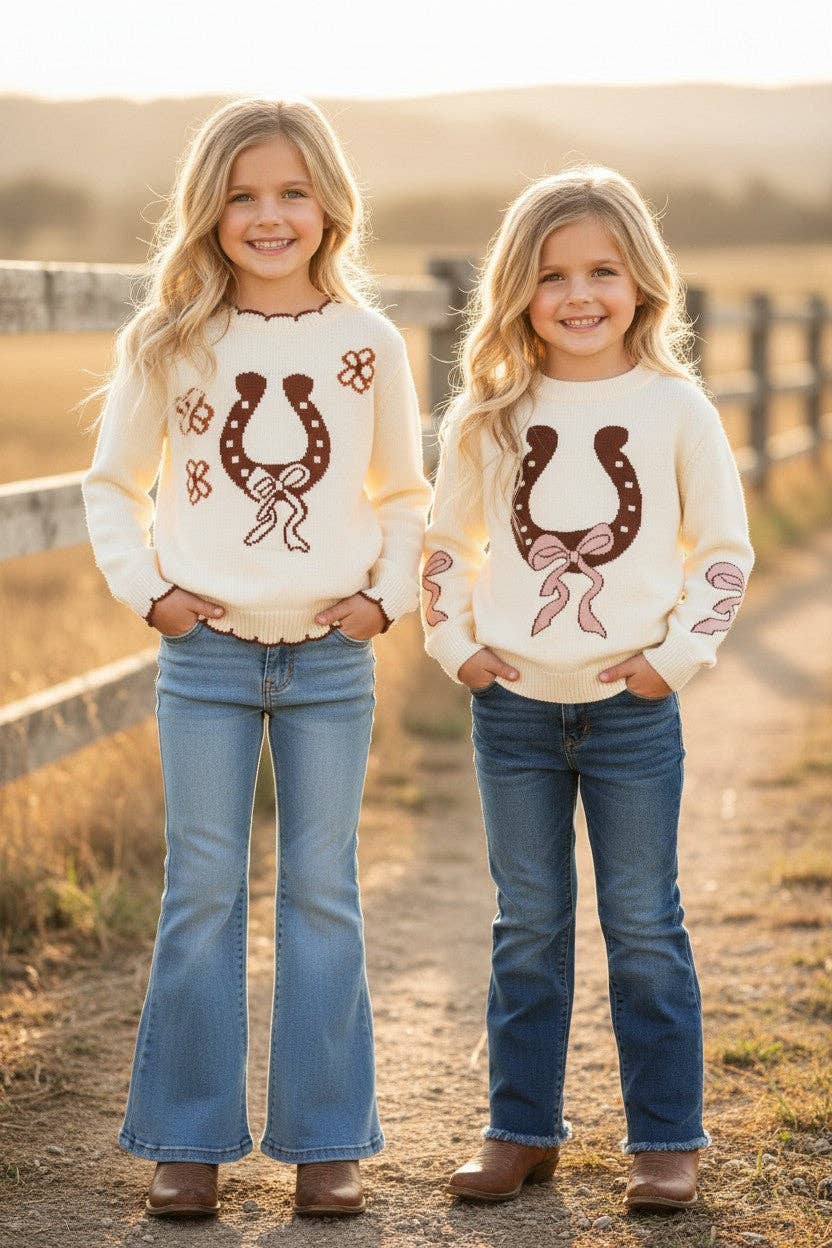Horseshoe knit sweater w/ pink bow on sleeves. TPG60533 JEAN