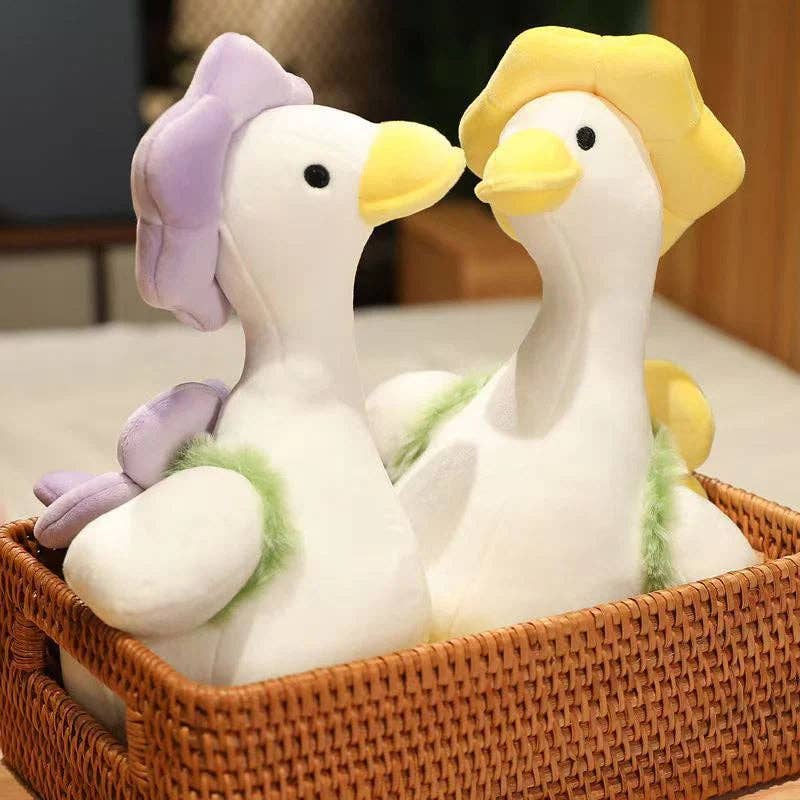 13" Goose plushies! Available in two colors.