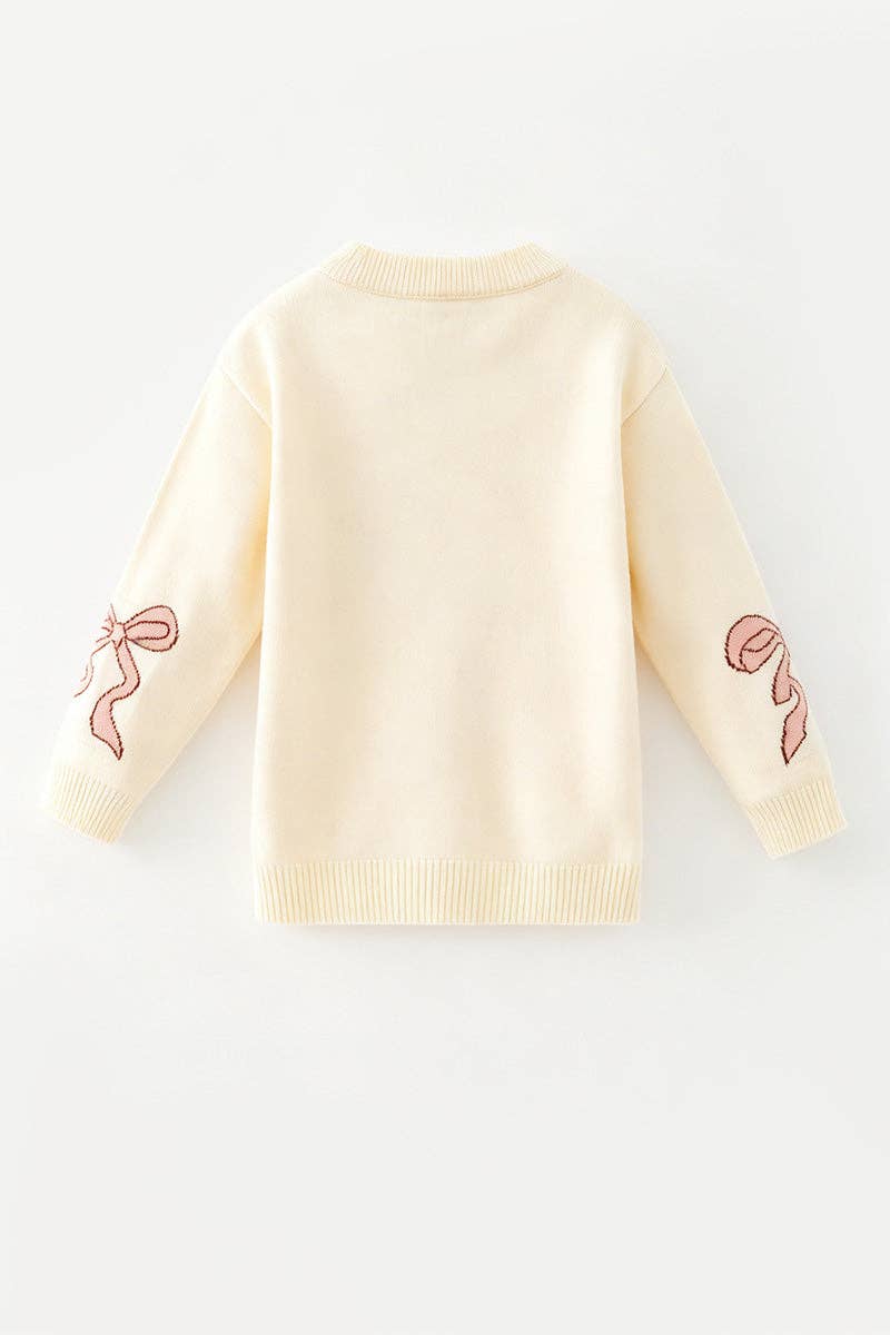 Horseshoe knit sweater w/ pink bow on sleeves. TPG60533 JEAN